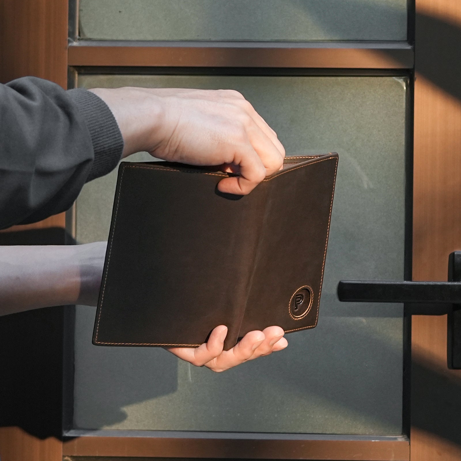 Luxury RFID Blocking Leather Passport Holder Travel Wallet with AirTag Slot (Model Display)